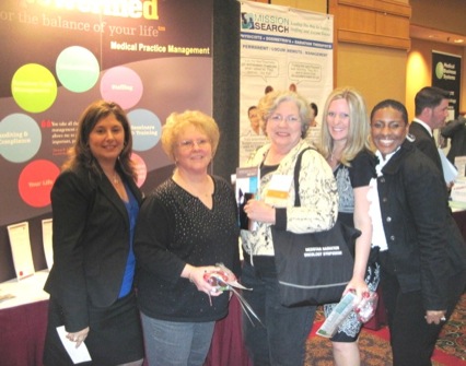 Donna Neil and Lashelle Bolton, mpowermed, visit with attendees